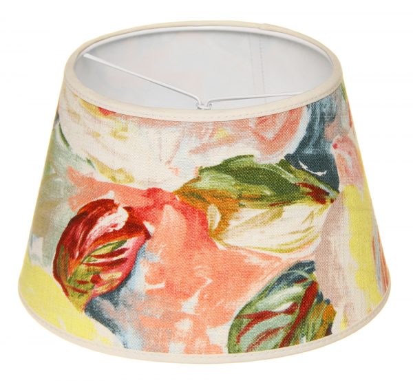 Lampunvarjostin jossa on värikäs kukka kuvio. Varjostin on materiaaliltaan laminoitua kangasta.