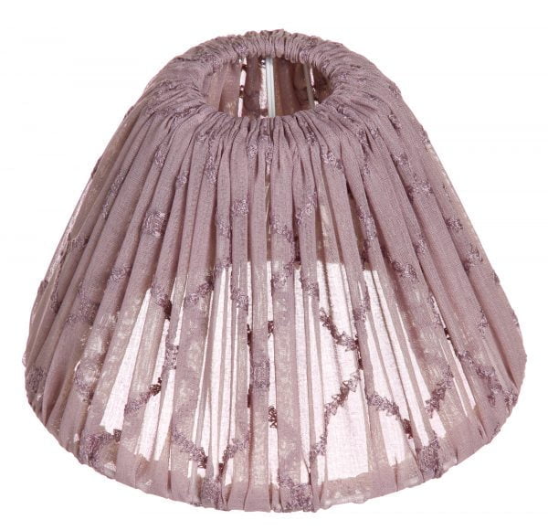 Yksivärinen lampunvarjostin jonka väri on lila. Varjostin on materiaaliltaan kangasta.