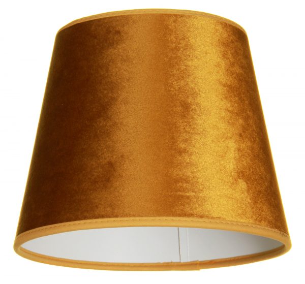 Yksivärinen lampunvarjostin jonka väri on kulta. Varjostin on materiaaliltaan laminoitua kangasta. Sisäpuoli on valkoinen.