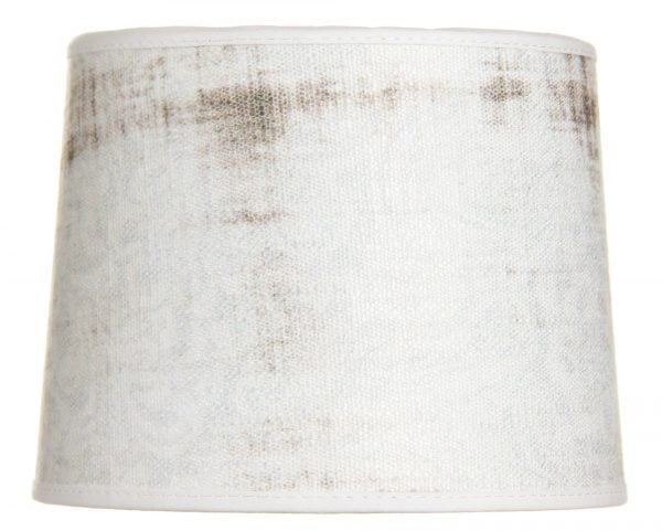 Beige Valentin-17 on lampunvarjostin jossa on vaalealla pohjalla beige kuvio. Varjostin on materiaaliltaan laminoitua kangasta.