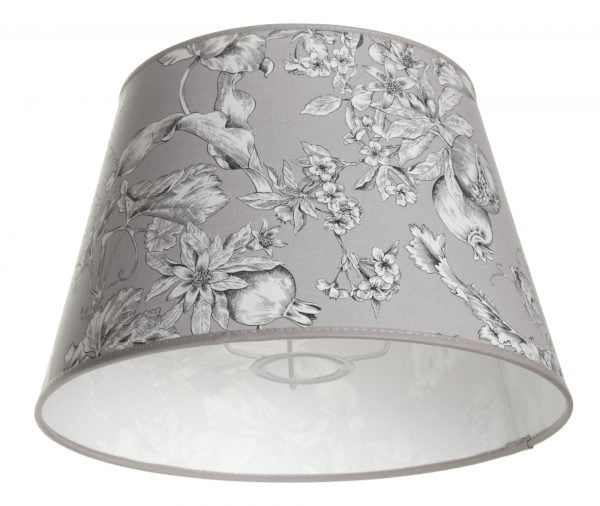 Lampunvarjostin jossa on harmaalla pohjalla kukka kuvio. Varjostin on materiaaliltaan laminoitua kangasta.